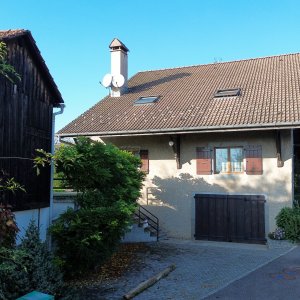 DEUX APPARTEMENTS SITUES DANS UN CADRE IDYLIQUE A PROXIMITE DE GENEVE EN FRANCE